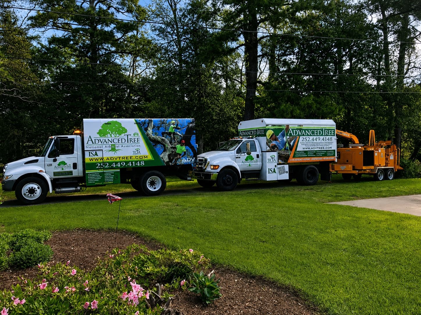 Advanced Tree trucks and specialized equipment ready for managed-property tree work